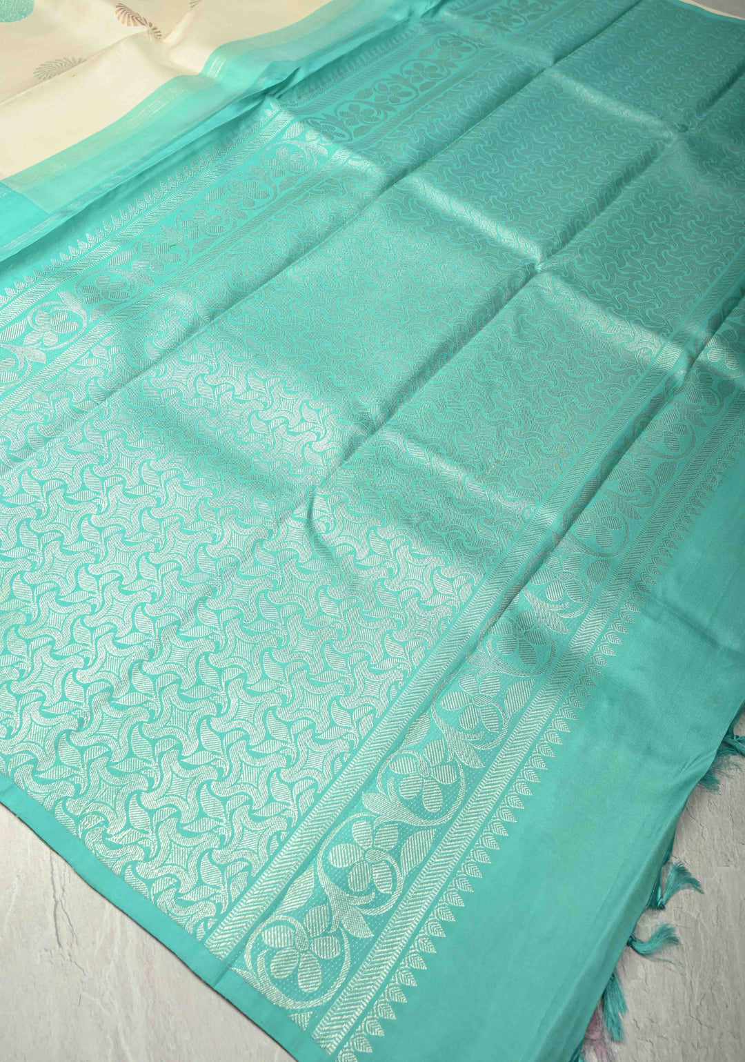 Ivory Handloom Pure Silk Kanchipattu Saree with Resham Meenakari Buttas and Pastel Hued Wide Zari Border | SILK MARK CERTIFIED