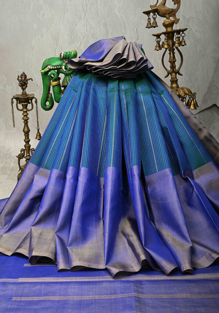 Peacock Blue Dual tone Handloom Pure Silk Kanchipattu Saree with Vertical Zari Stripes and Contrast Wide Border  | SILK MARK CERTIFIED