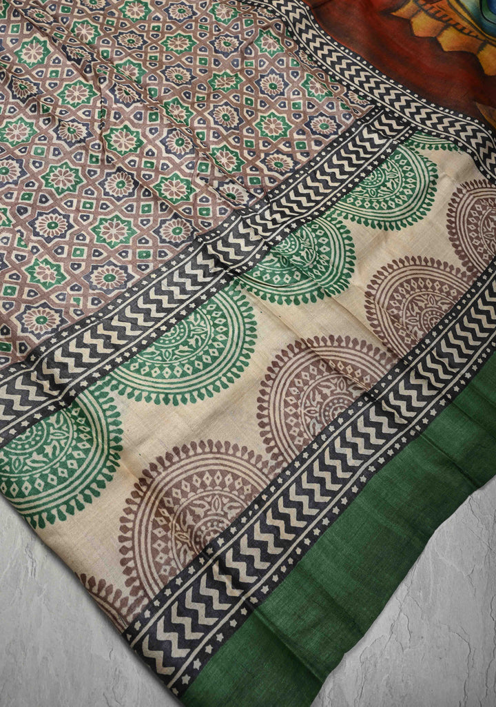Brown Jari Tussar Silk saree with Ajrakh Design Block Print and Handpainted Krishna Face on Pallu | SILK MARK CERTIFIED