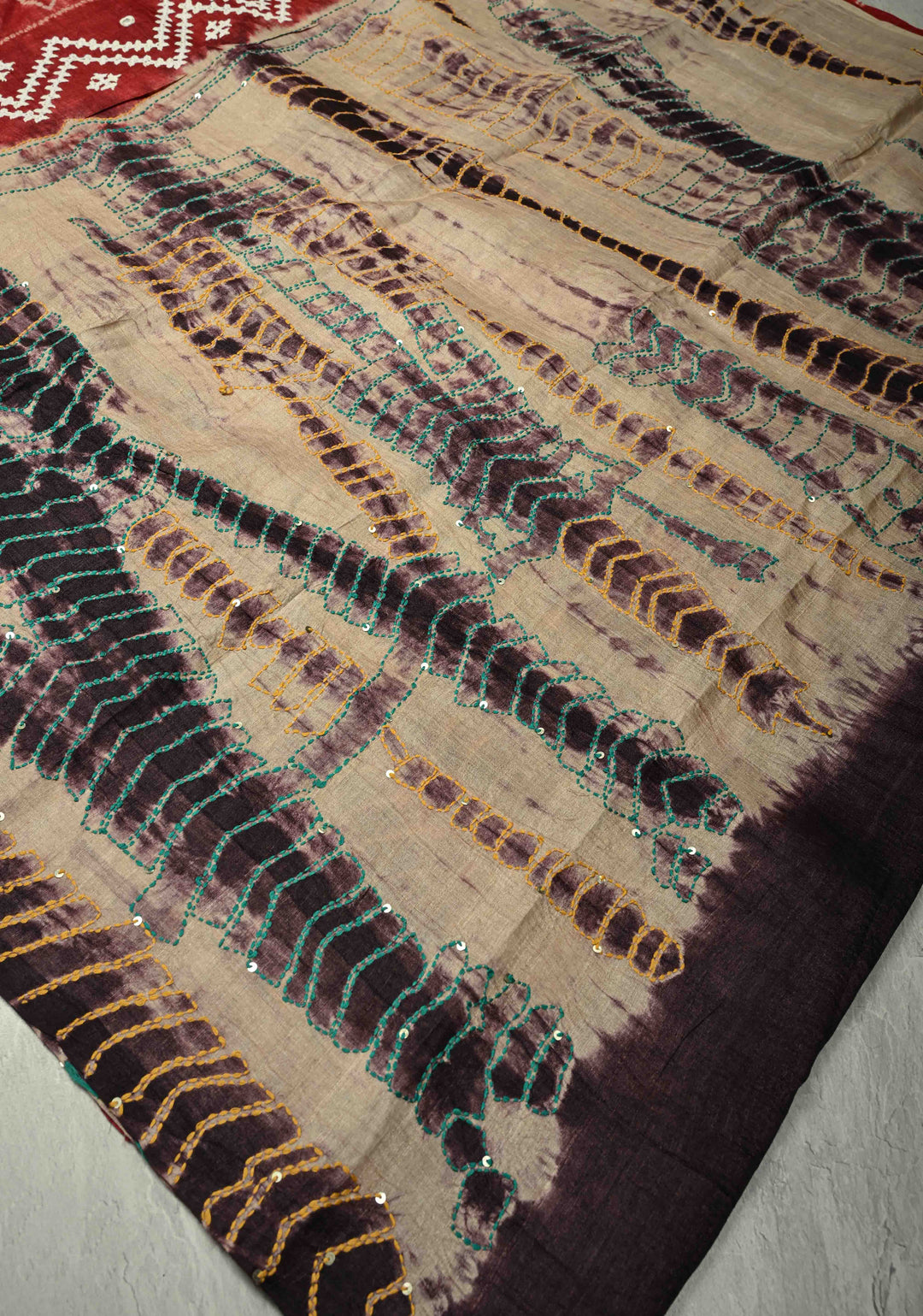 Brick Red Borderless Tussar Silk Saree with Shibori and Kantha Kutchi-Style Embroidery   | SILK MARK CERTIFIED