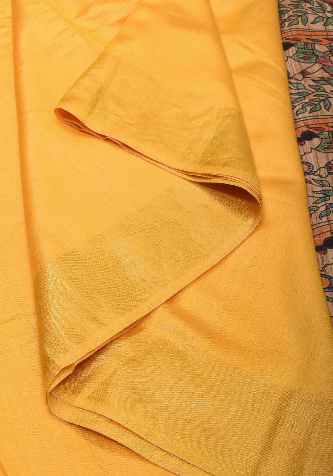 Sulphur Yellow Semi Tussar Silk, adorned with a Madhubani Gecha Tussar Pallu and Zari Border.