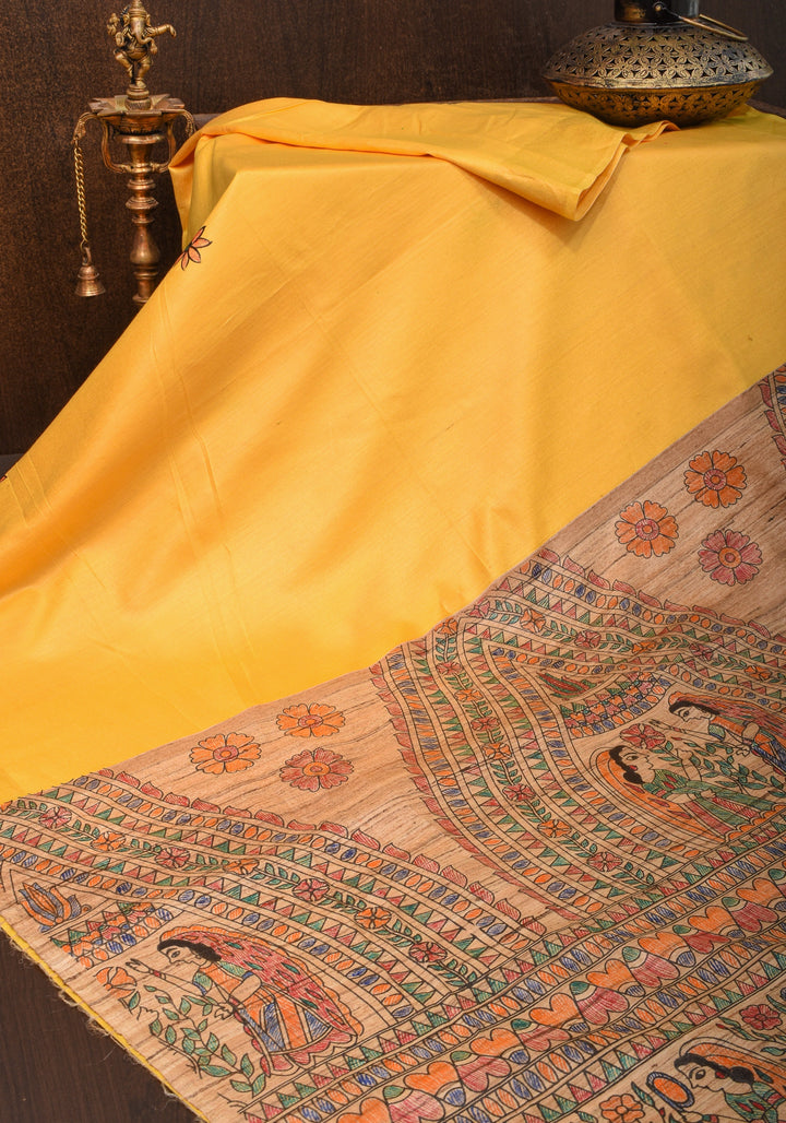 Sulphur Yellow Semi Tussar Silk, adorned with a Madhubani Gecha Tussar Pallu and Zari Border.
