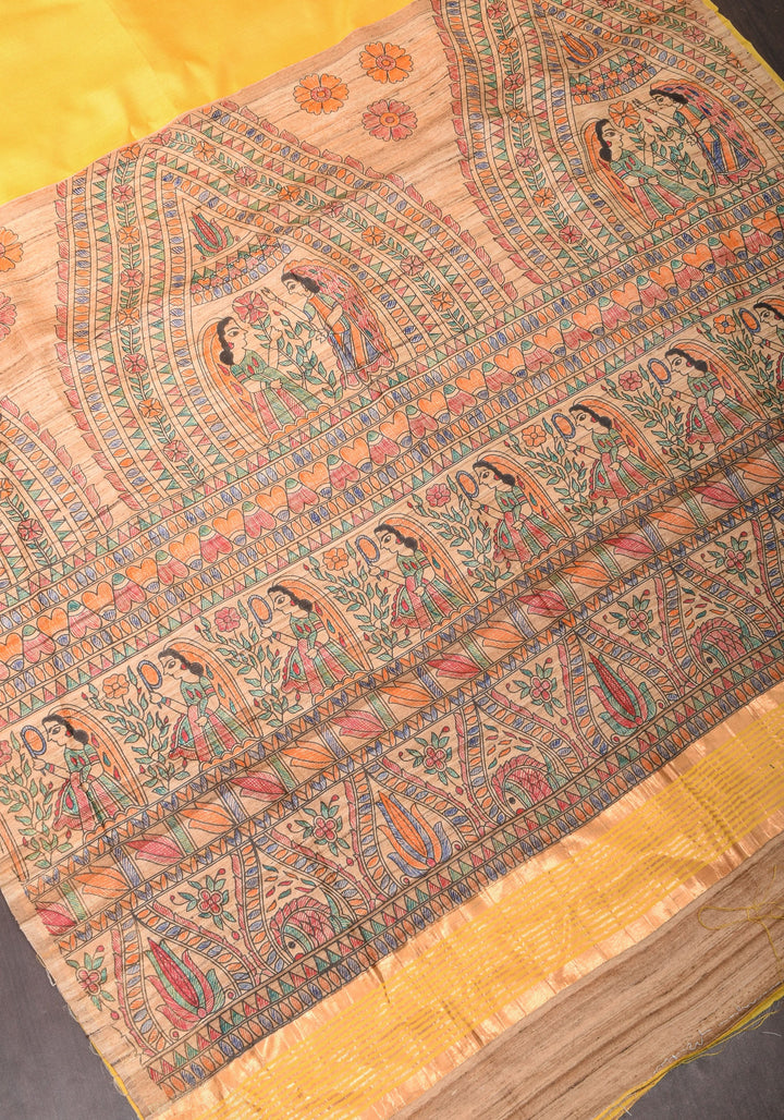 Sulphur Yellow Semi Tussar Silk, adorned with a Madhubani Gecha Tussar Pallu and Zari Border.