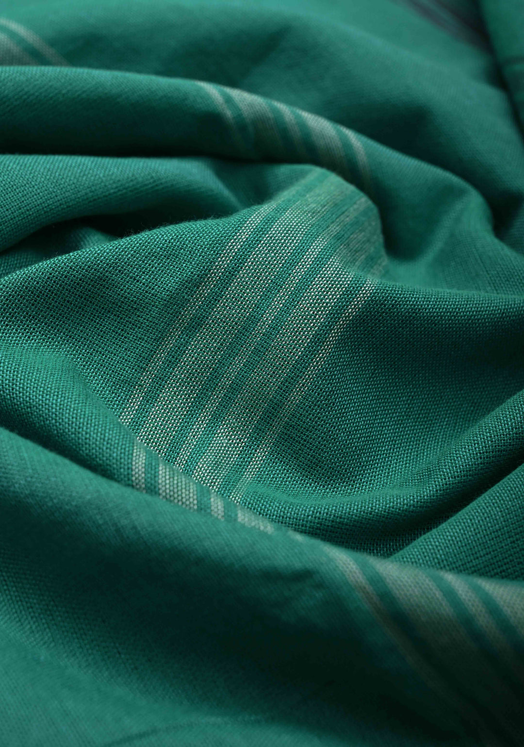 Green Handloom Bhujodi Kala Cotton Saree with buttas and honeycomb tassels