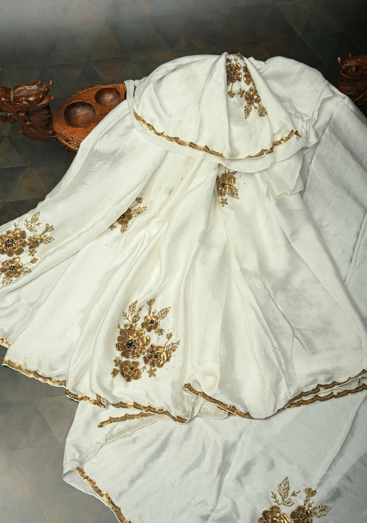 Ivory Satin Georgette Saree with Antique Matte Finish Cutdana, Sequins and Moti Embellishment and Scallop Border