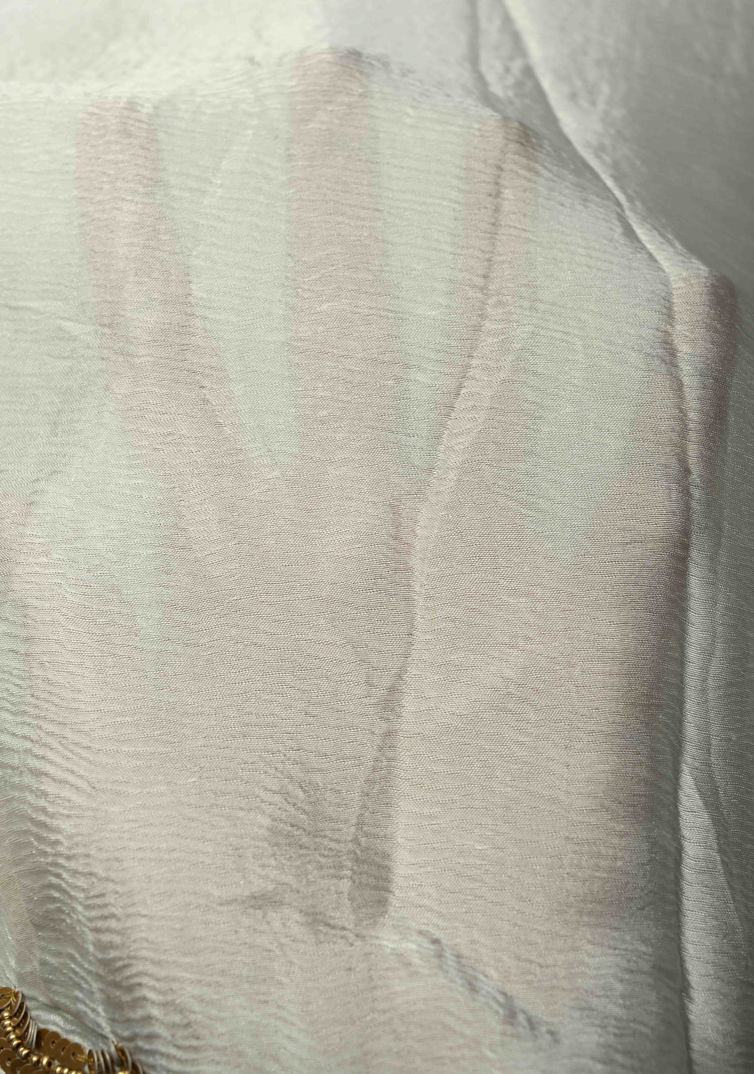 Ivory Satin Georgette Saree with Antique Matte Finish Cutdana, Sequins and Moti Embellishment and Scallop Border