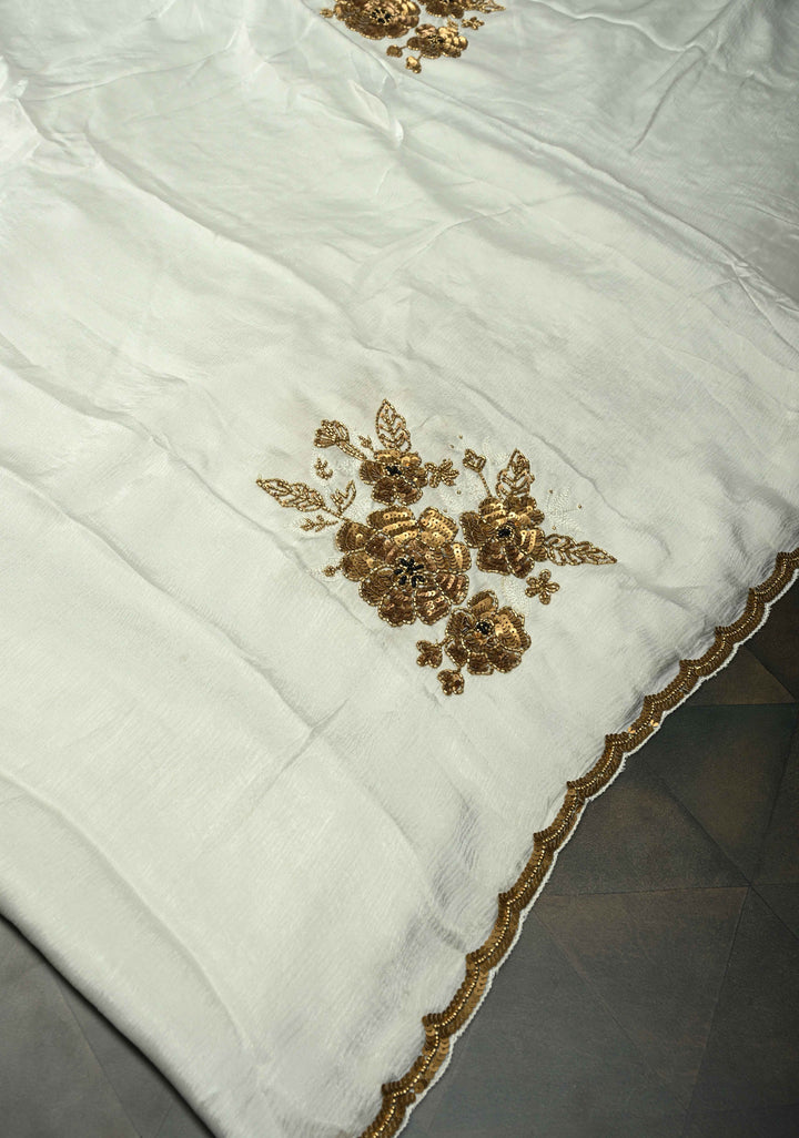 Ivory Satin Georgette Saree with Antique Matte Finish Cutdana, Sequins and Moti Embellishment and Scallop Border