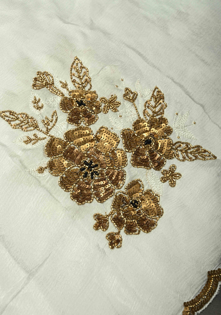 Ivory Satin Georgette Saree with Antique Matte Finish Cutdana, Sequins and Moti Embellishment and Scallop Border