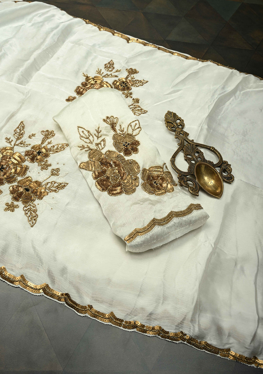 Ivory Satin Georgette Saree with Antique Matte Finish Cutdana, Sequins and Moti Embellishment and Scallop Border