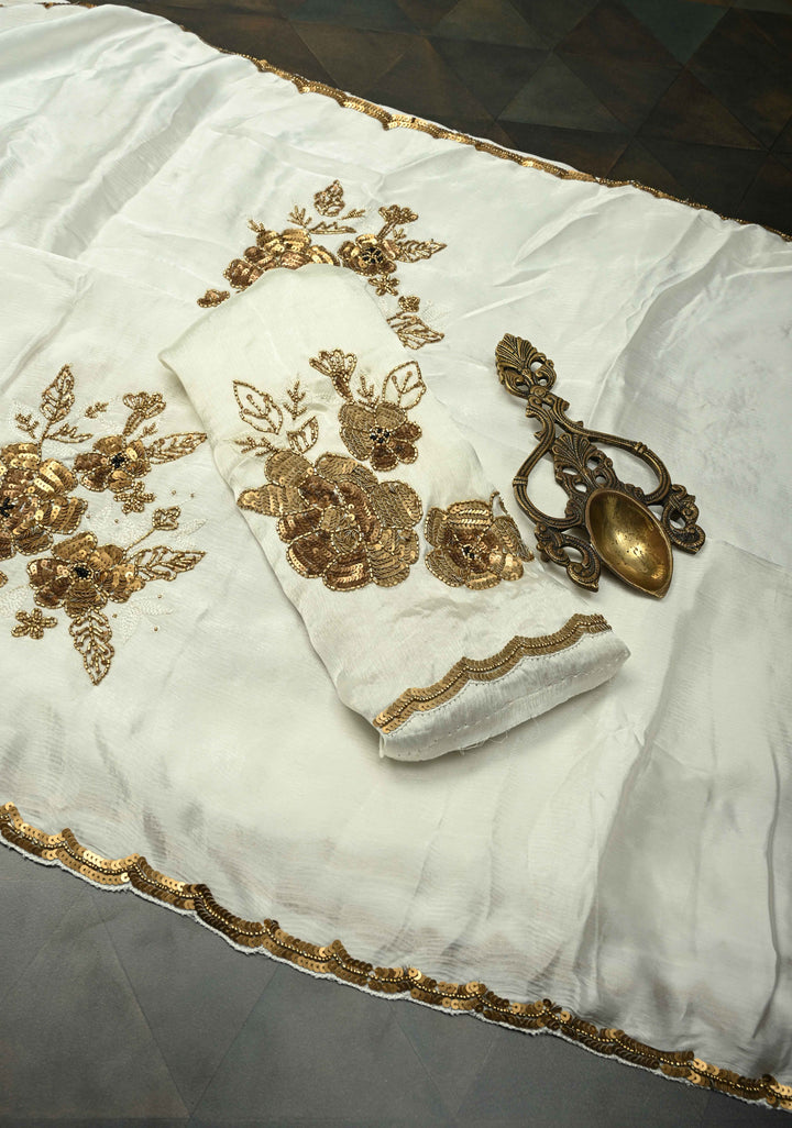 Ivory Satin Georgette Saree with Antique Matte Finish Cutdana, Sequins and Moti Embellishment and Scallop Border