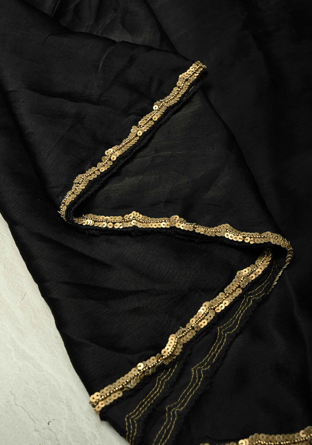 Black Satin Georgette Saree with Antique Matte Finish Cutdana, Sequins and Moti Embellishment and Scallop Border