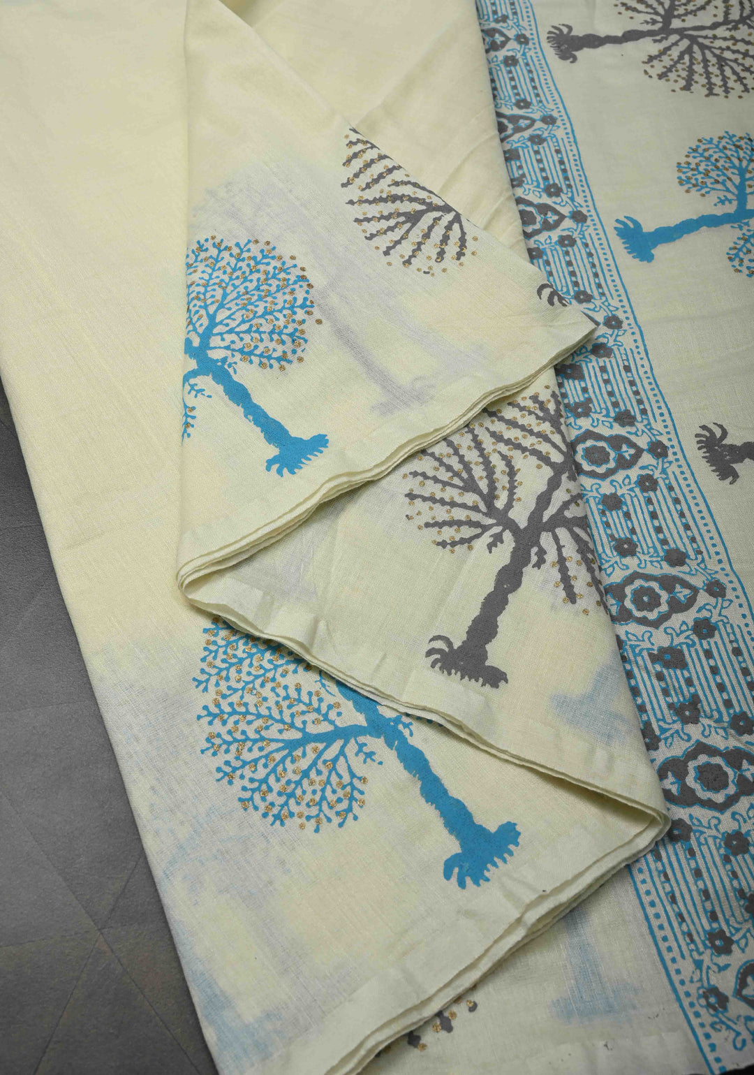 Off White Uppada Handloom Cotton Saree with Tree of life Buttas on Border and Pallu