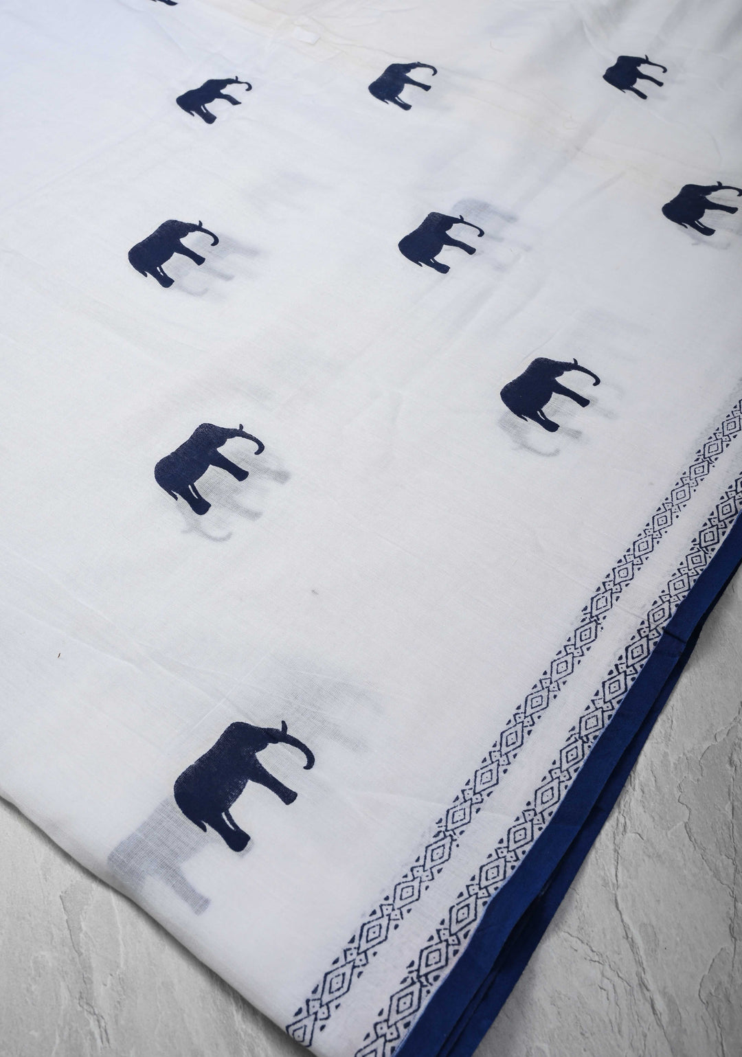 White Uppada Cotton Saree with Elephant Block Buttas and Contrast Border