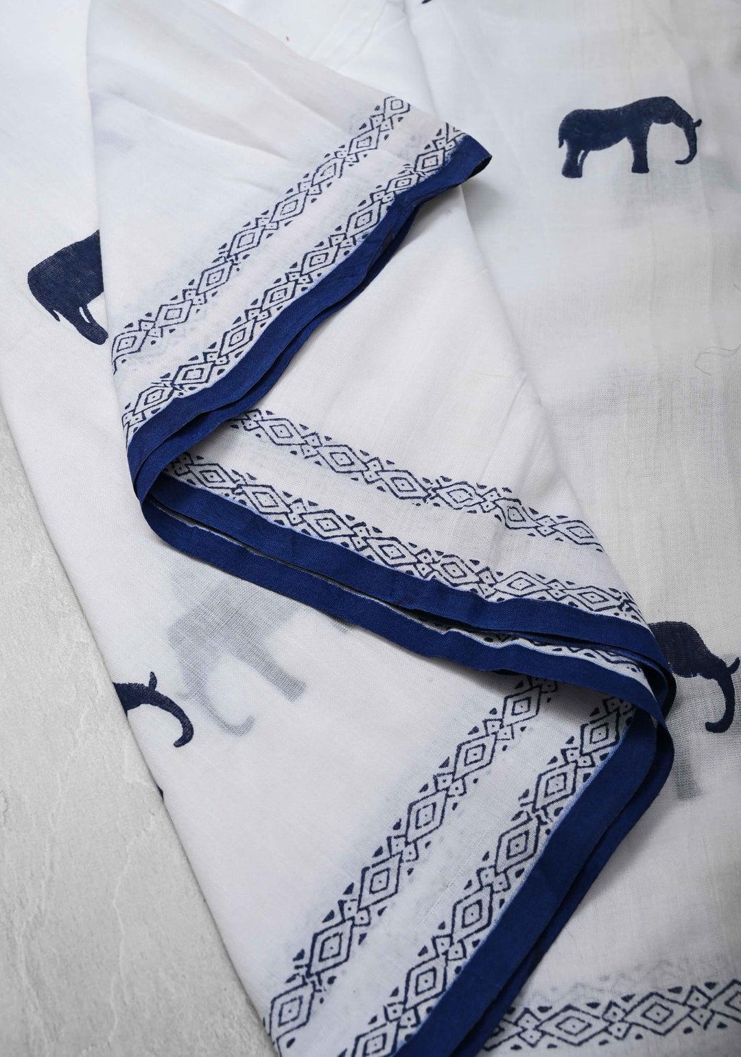 White Uppada Cotton Saree with Elephant Block Buttas and Contrast Border