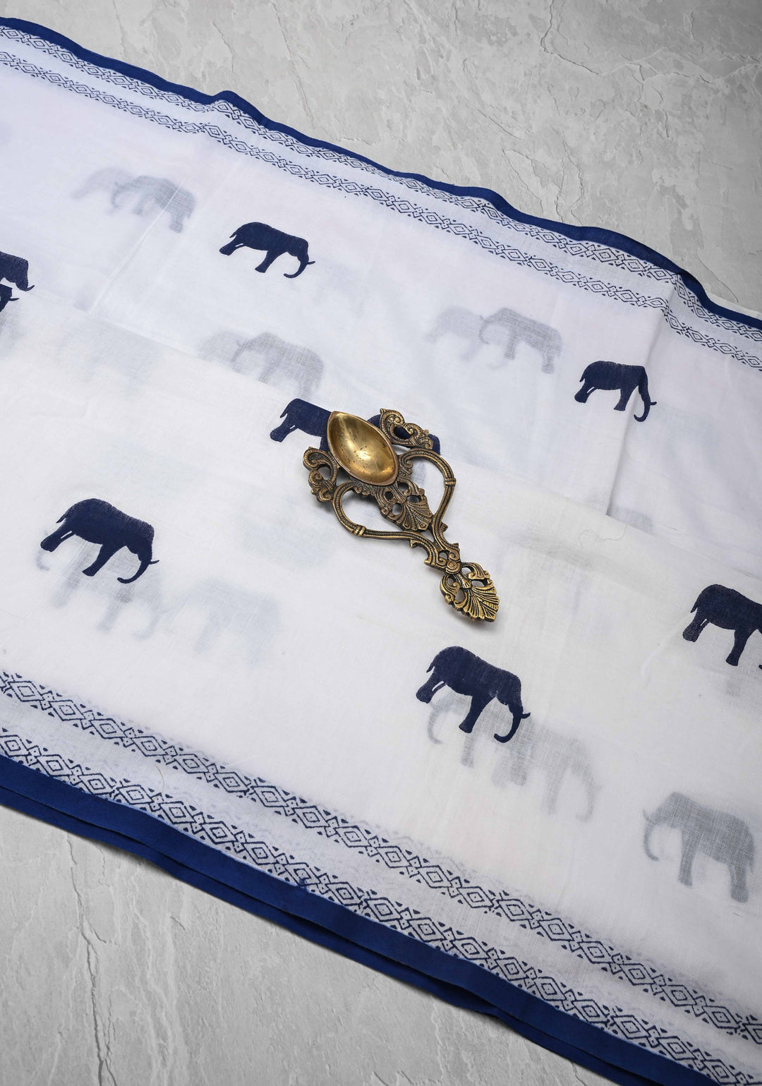 White Uppada Cotton Saree with Elephant Block Buttas and Contrast Border