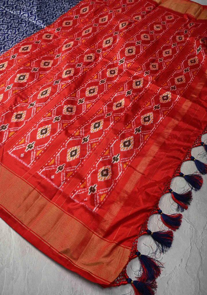 Indonesian pattern Navy Blue Pochampally Ikkat Pure Brocade Silk Saree  and Contrast Panel Zari Border | SILK MARK CERTIFIED