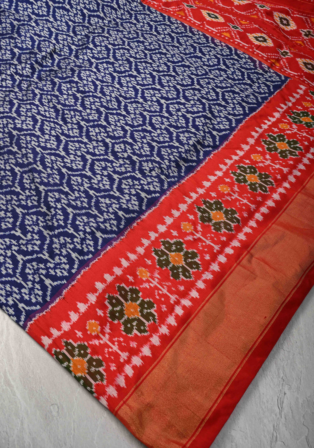 Indonesian pattern Navy Blue Pochampally Ikkat Pure Brocade Silk Saree  and Contrast Panel Zari Border | SILK MARK CERTIFIED