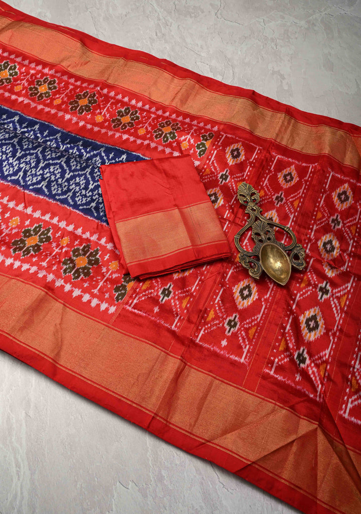 Indonesian pattern Navy Blue Pochampally Ikkat Pure Brocade Silk Saree  and Contrast Panel Zari Border | SILK MARK CERTIFIED