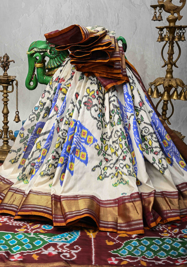 Off White Pochampally Ikkat Pure Silk Saree with Peacock Motifs and Contrast Zari Border | SILK MARK CERTIFIED