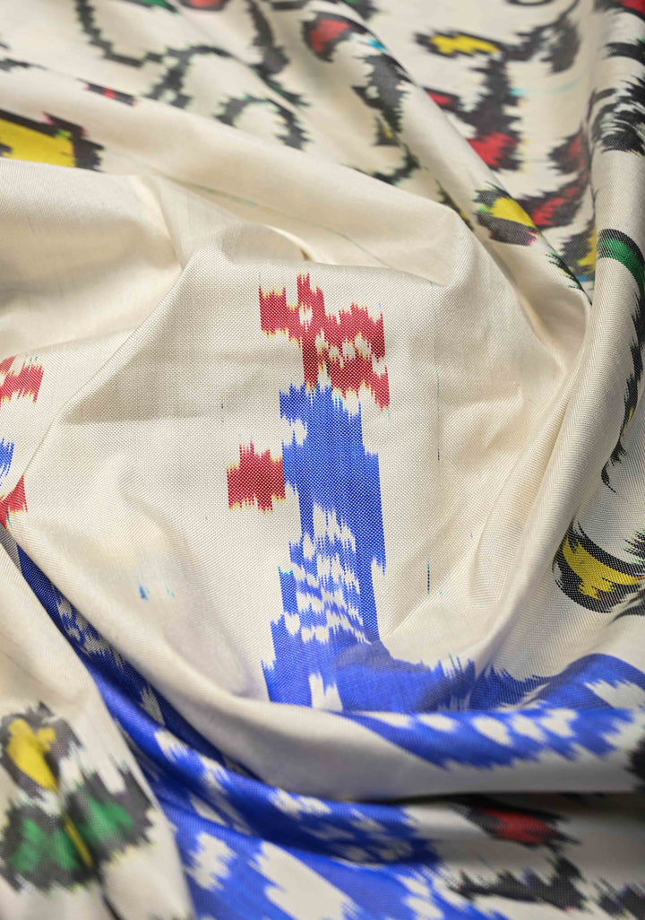 Off White Pochampally Ikkat Pure Silk Saree with Peacock Motifs and Contrast Zari Border | SILK MARK CERTIFIED