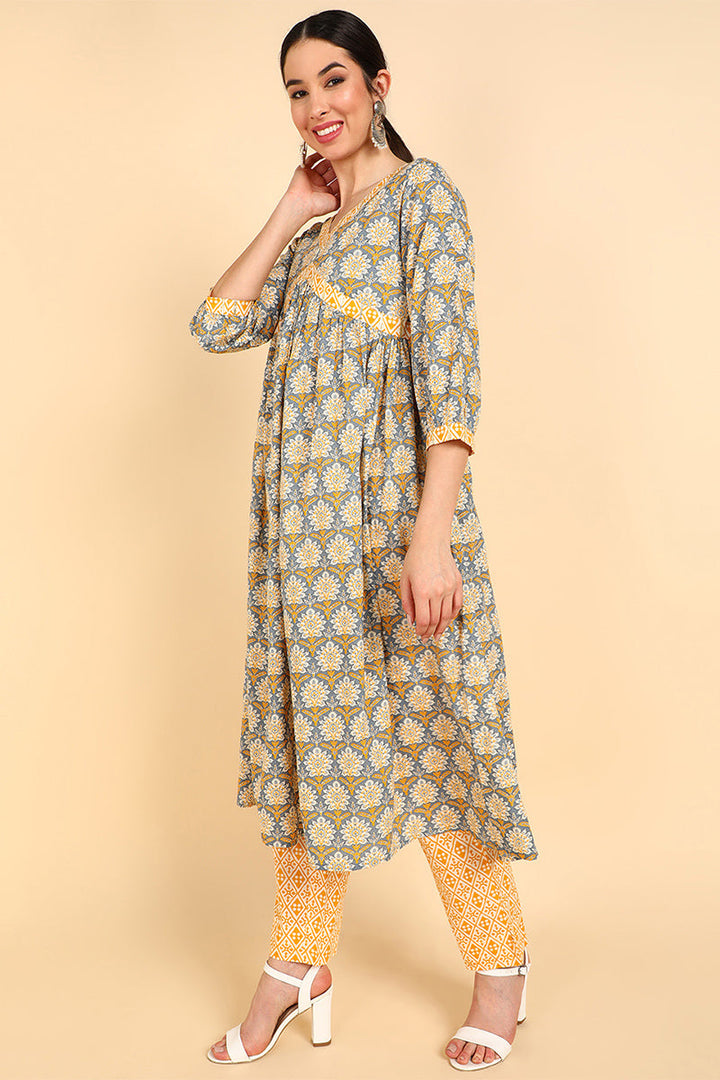 Yellow Pure Cotton Ethnic Motifs Printed Flared Style Suit Set   | SHOBITAM