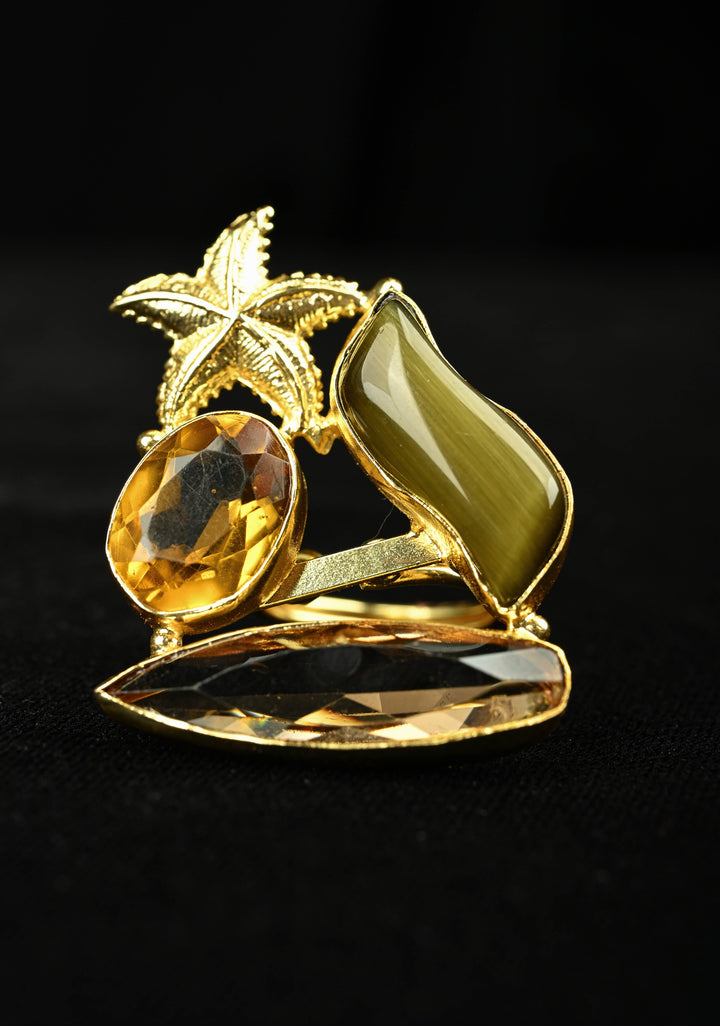 Starfish Motif Ring with Yellow-White-Green Glass Gemstone
