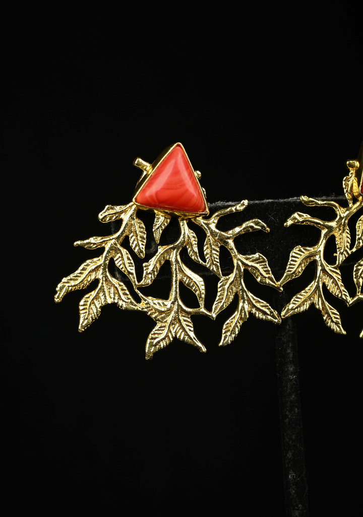 Stud Earring With Coral Triangular-Shaped Stone and Gold Leaf Design