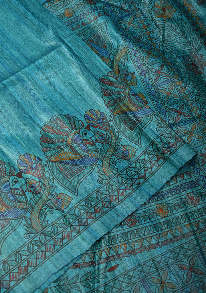 Teal Blue Madhubani hand painting on Geecha Tussar Silk Saree | SILK MARK CERTIFIED