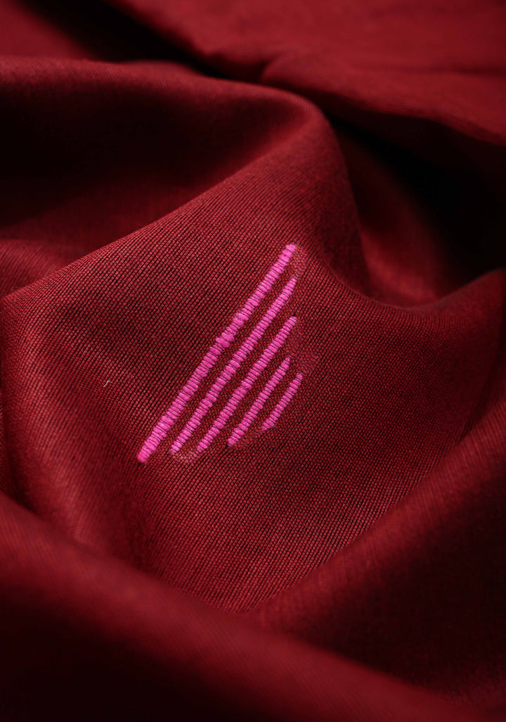 Deep Maroon Handwoven Silk Linen Saree with Meenakari Thread Buttas and Muted Minimal Zari Border