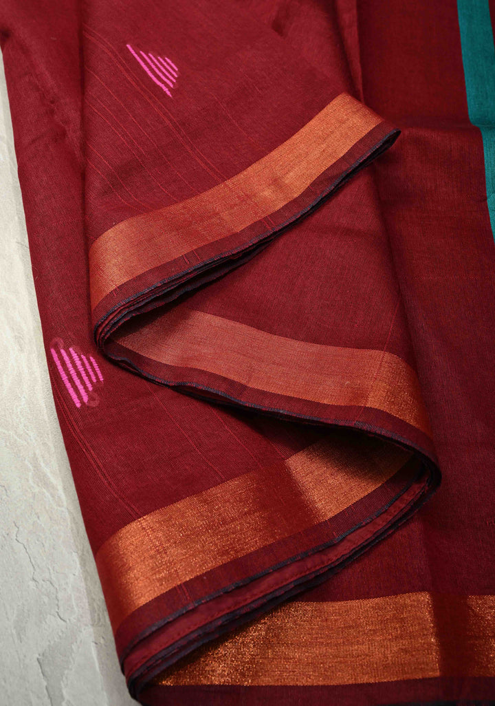 Deep Maroon Handwoven Silk Linen Saree with Meenakari Thread Buttas and Muted Minimal Zari Border