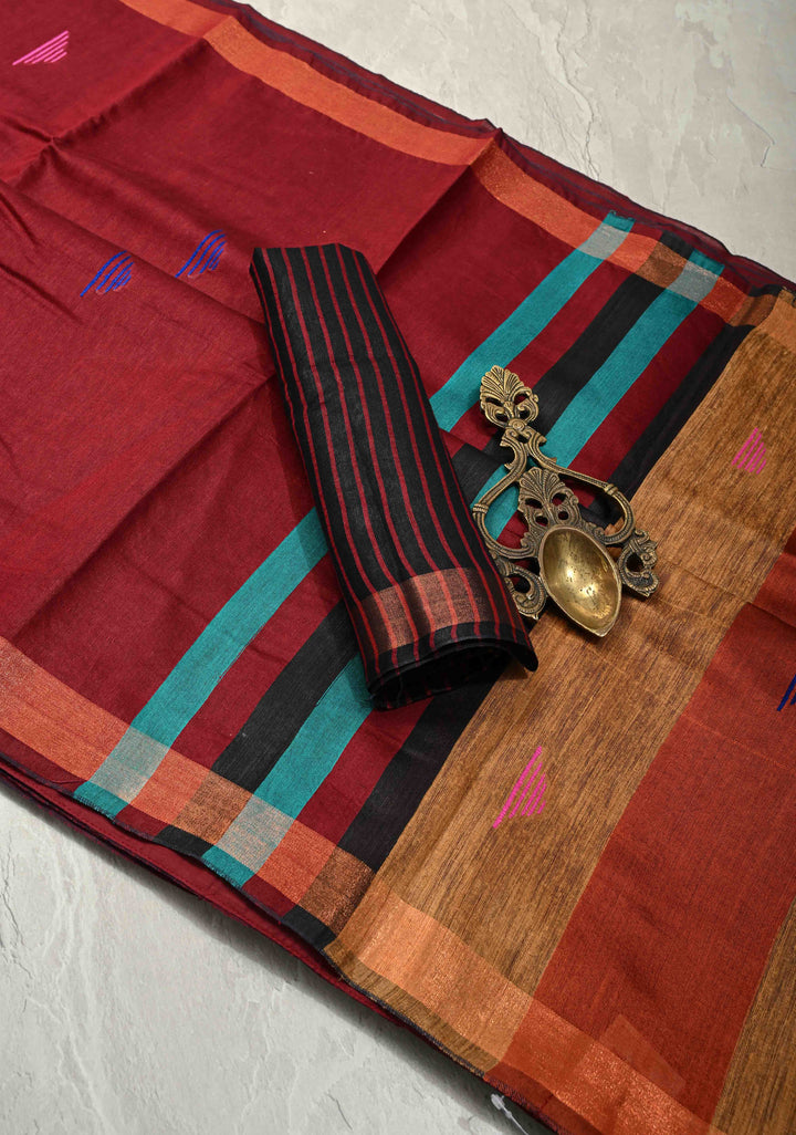 Deep Maroon Handwoven Silk Linen Saree with Meenakari Thread Buttas and Muted Minimal Zari Border