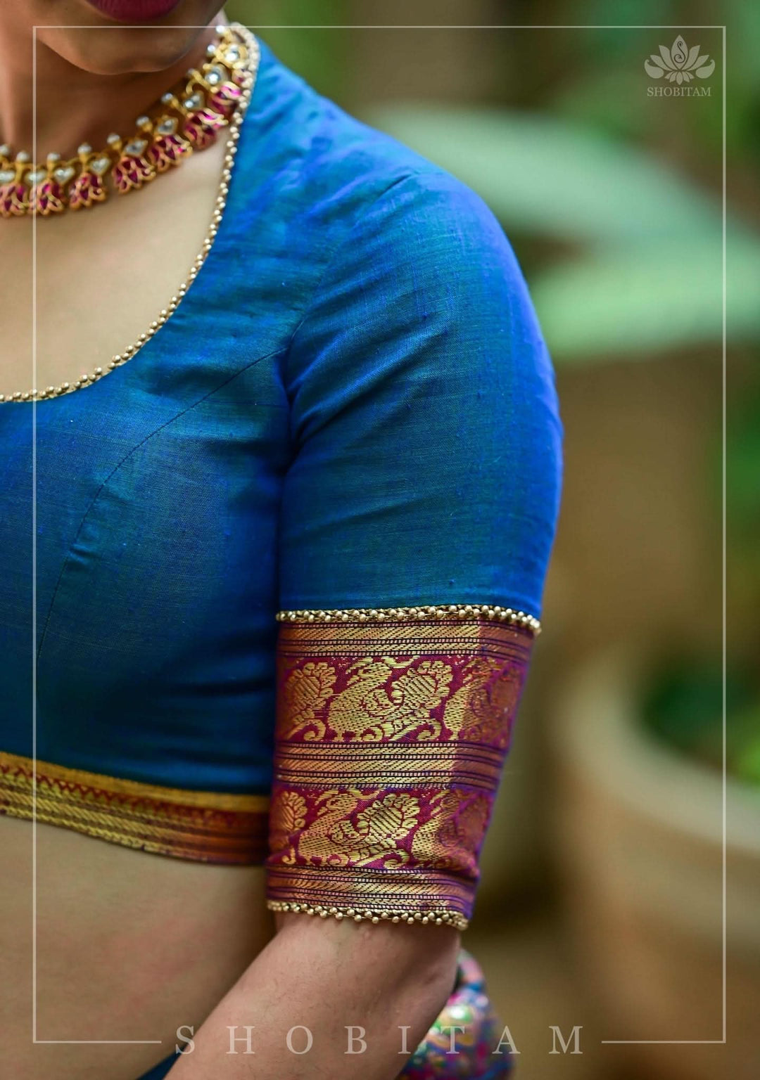Teal Blue Narayanpet Cotton Blouse with cutout back and zari detailing