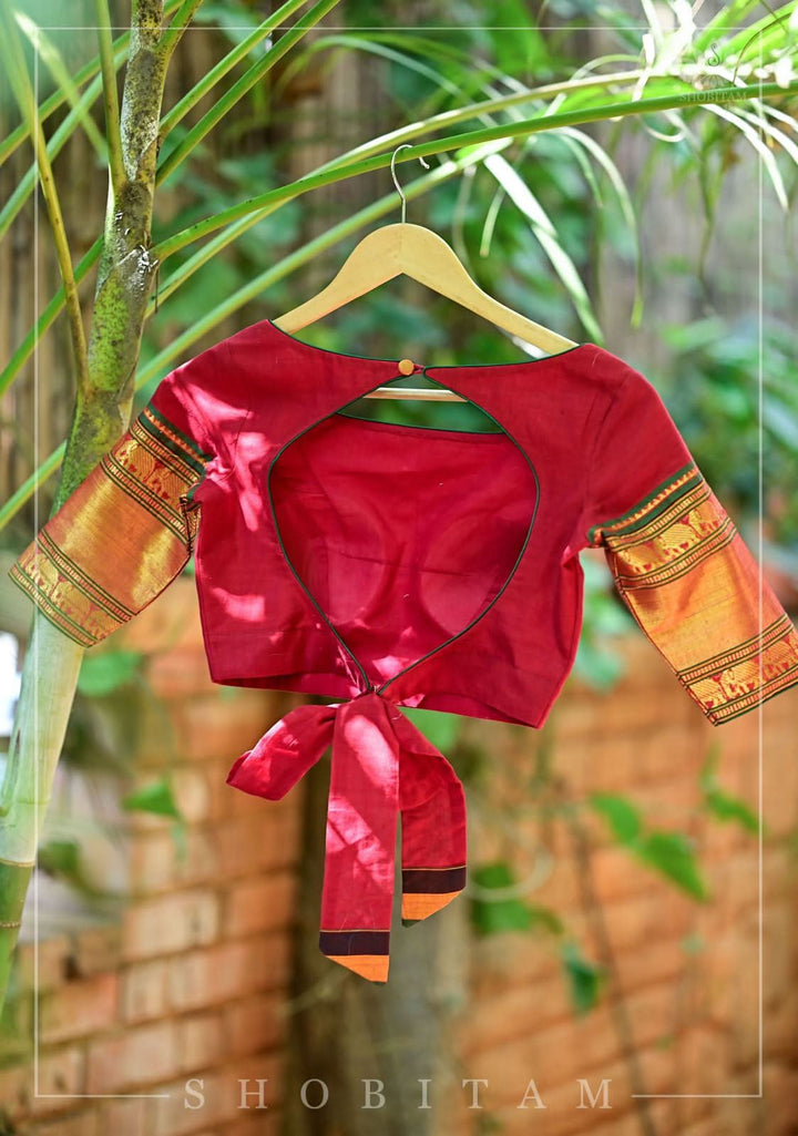 Maroon Narayanpet cotton boatneck blouse with oval cutout and tieback design