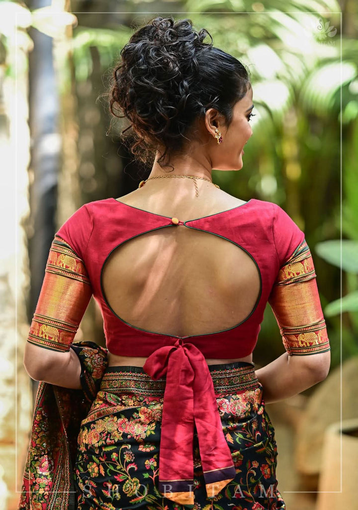 Maroon Narayanpet cotton boatneck blouse with oval cutout and tieback design