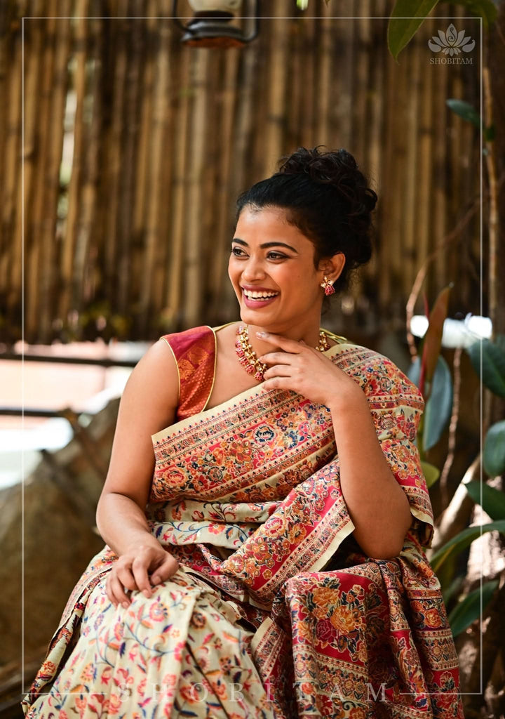 Unique Kani Design with Floral Jaal in Beige and Red Rayon Saree. Shobitam Unique Saree