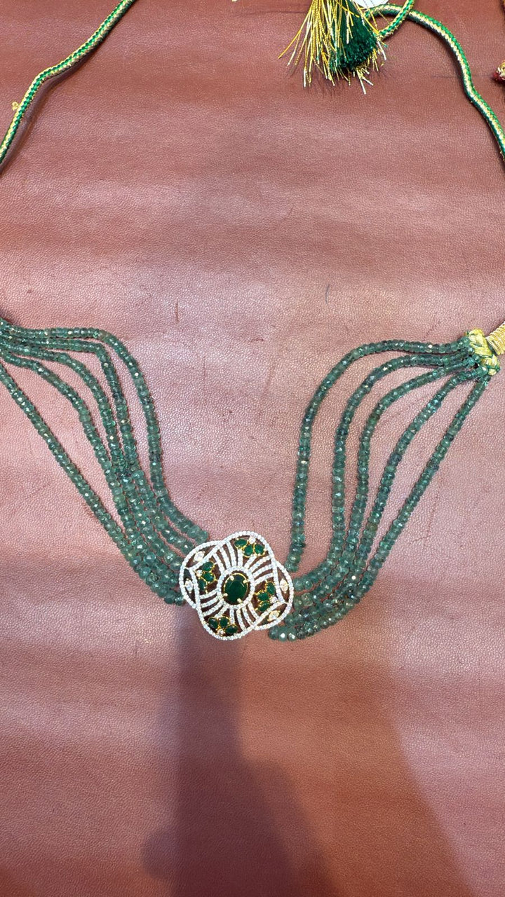 Pure Emerald 5 strand choker and earrings set with AD stones,