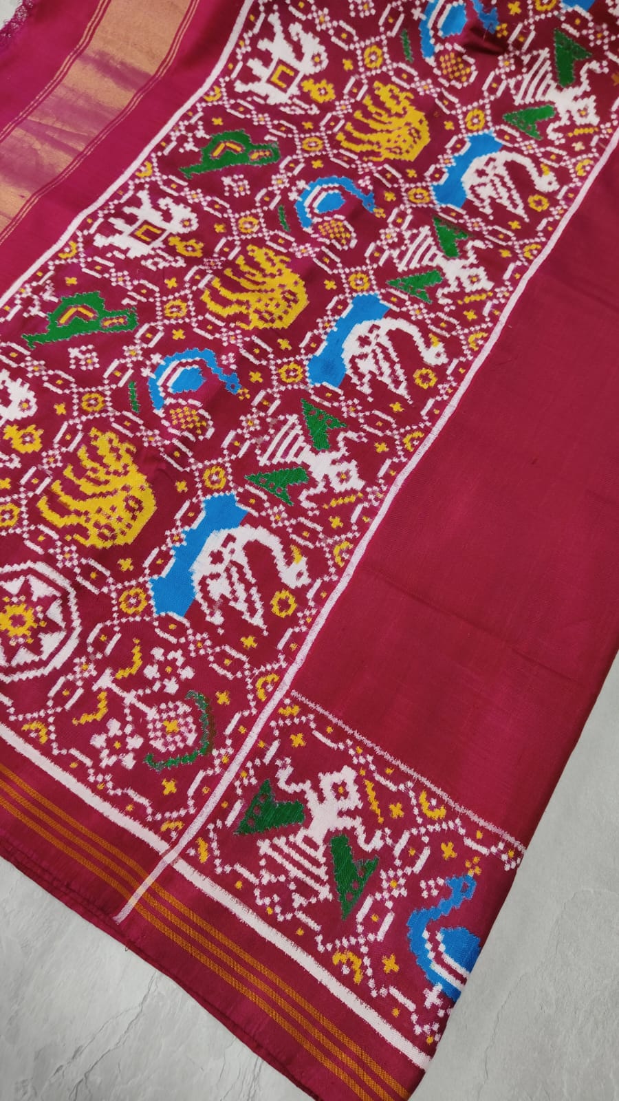 Celebrity Authentic Double Ikkat Patan Patola Handwoven Saree in Pinkish Red Dual tone with Flora Fauna Motifs on Border | SILK MARK CERTIFIED
