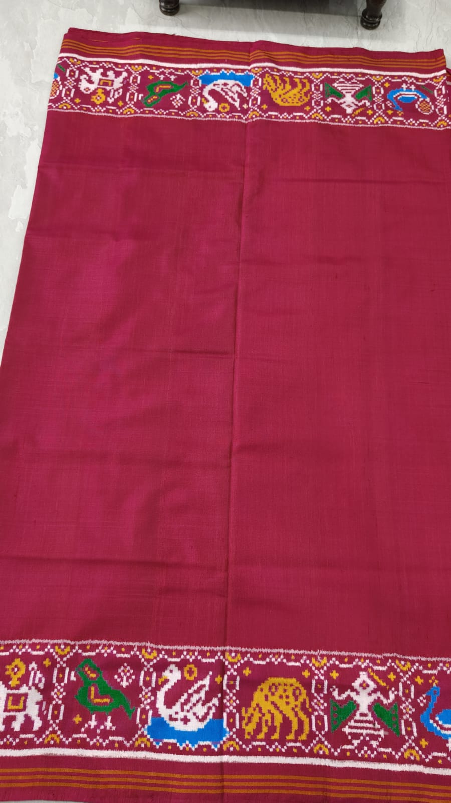 Celebrity Authentic Double Ikkat Patan Patola Handwoven Saree in Pinkish Red Dual tone with Flora Fauna Motifs on Border | SILK MARK CERTIFIED