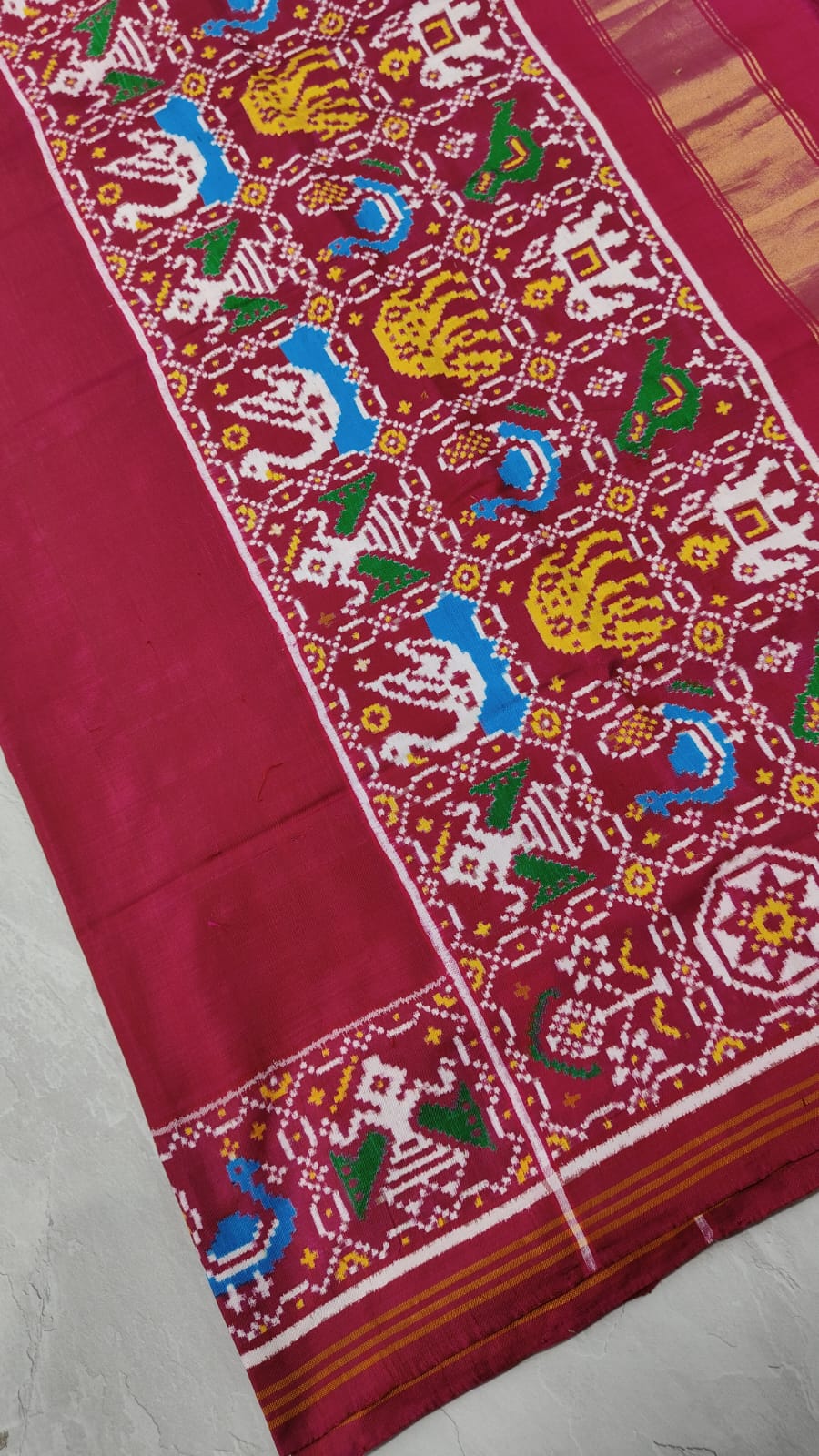 Celebrity Authentic Double Ikkat Patan Patola Handwoven Saree in Pinkish Red Dual tone with Flora Fauna Motifs on Border | SILK MARK CERTIFIED