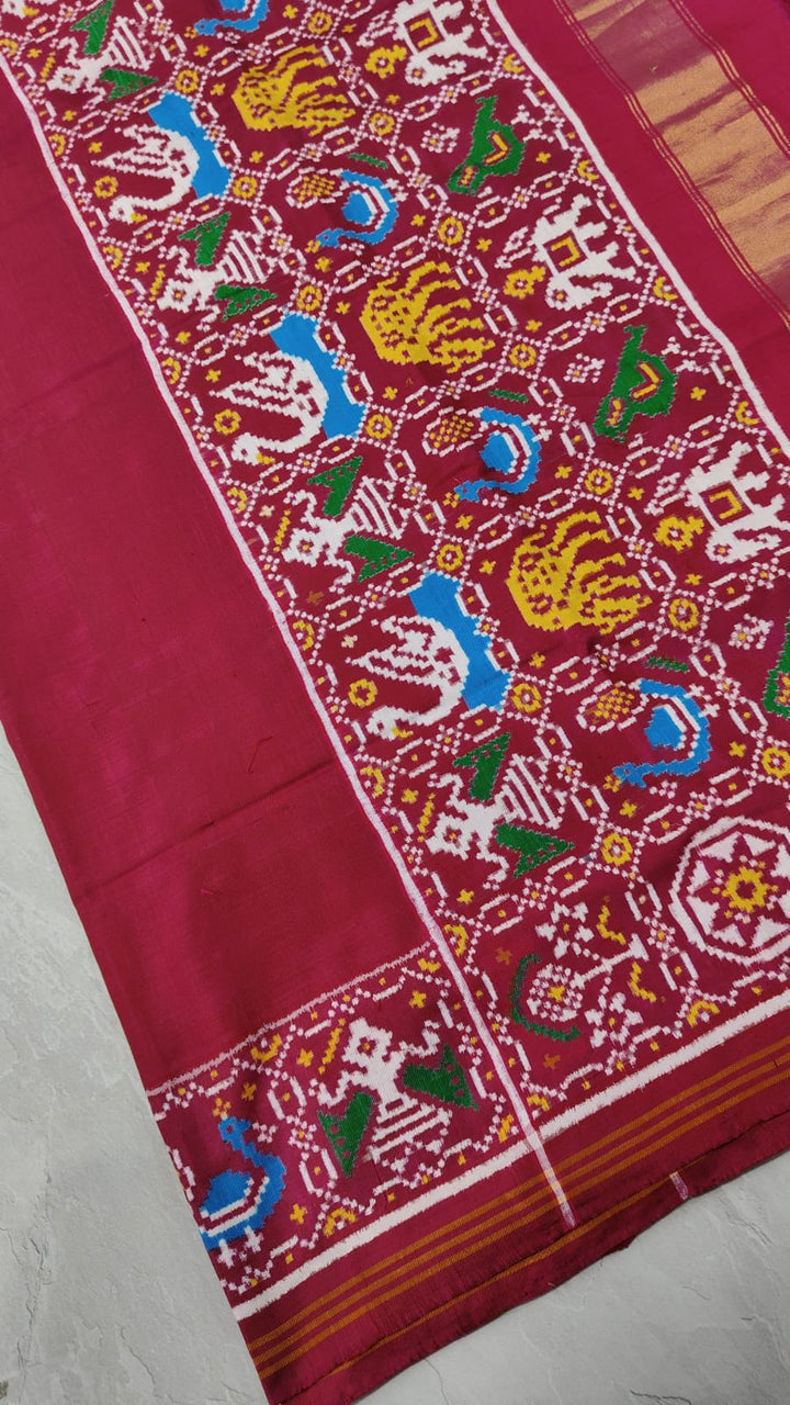 Celebrity Authentic Double Ikkat Patan Patola Handwoven Saree in Pinkish Red Dual tone with Flora Fauna Motifs on Border | SILK MARK CERTIFIED
