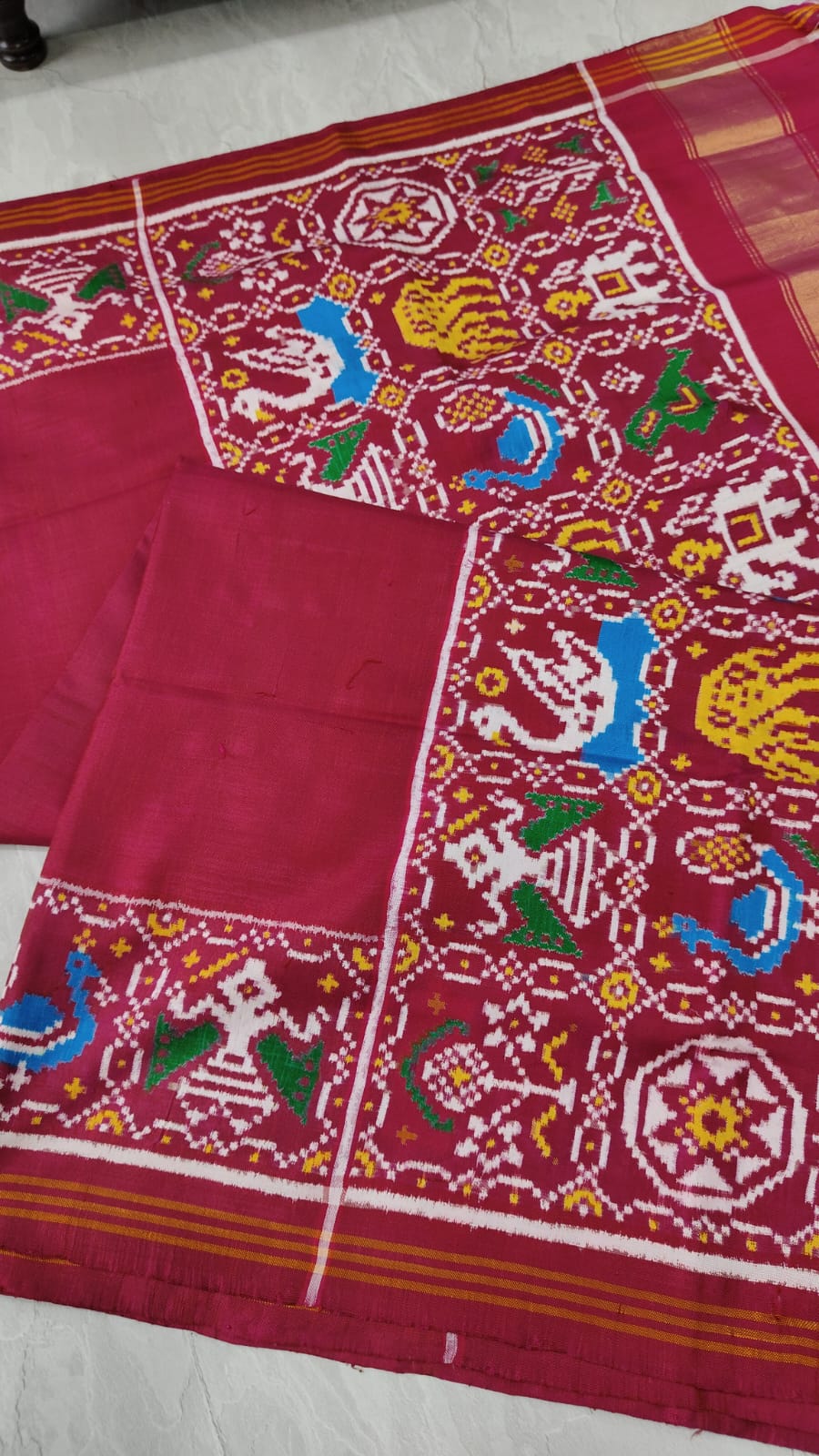 Celebrity Authentic Double Ikkat Patan Patola Handwoven Saree in Pinkish Red Dual tone with Flora Fauna Motifs on Border | SILK MARK CERTIFIED