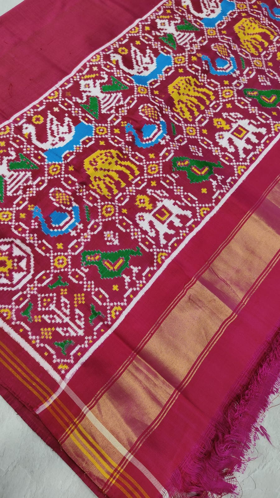 Celebrity Authentic Double Ikkat Patan Patola Handwoven Saree in Pinkish Red Dual tone with Flora Fauna Motifs on Border | SILK MARK CERTIFIED