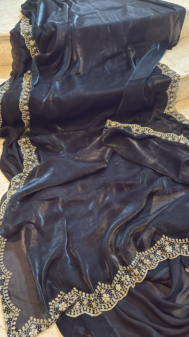 Black satin Georgette with stone work border and blouse piece