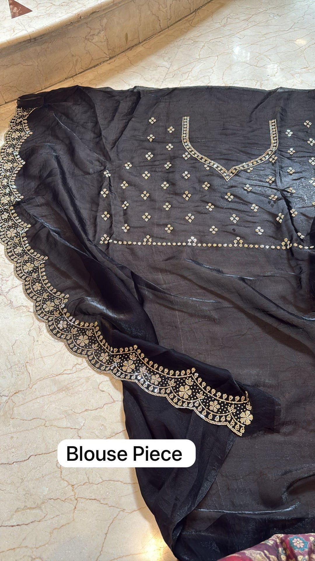 Black satin Georgette with stone work border and blouse piece