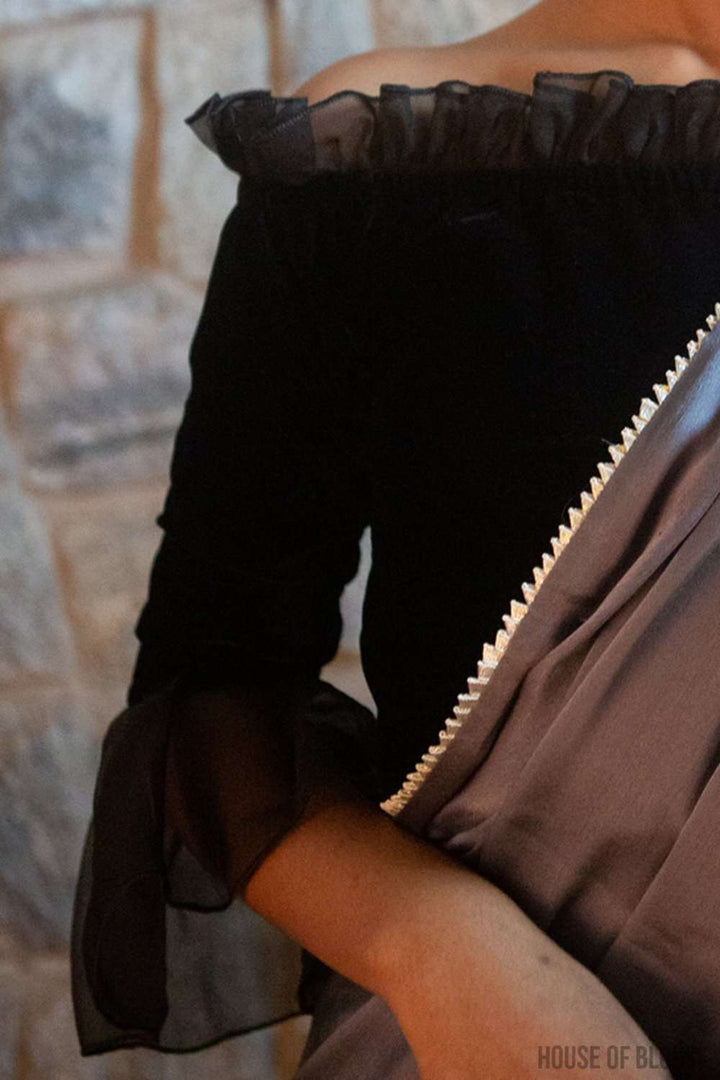 Black velvet off-shoulder blouse with  organza frill detailing