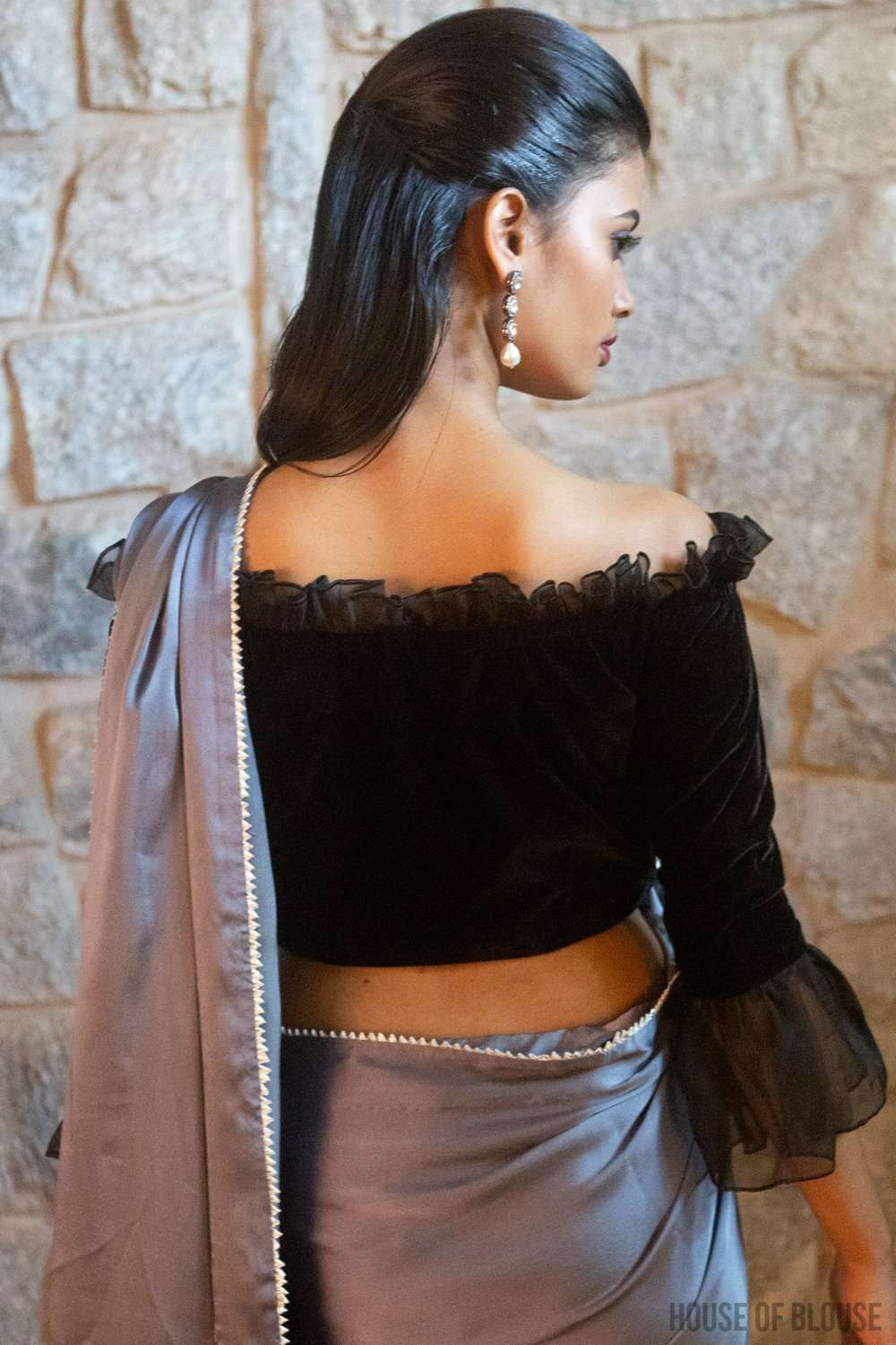 Black velvet off-shoulder blouse with  organza frill detailing