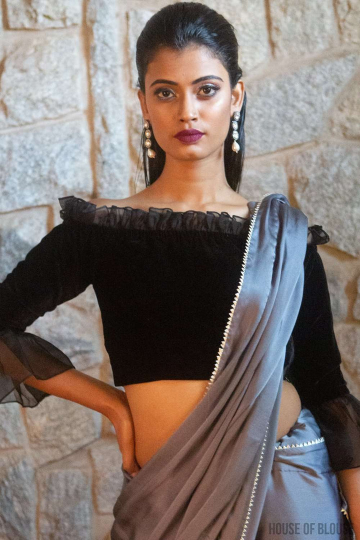 Black velvet off-shoulder blouse with  organza frill detailing