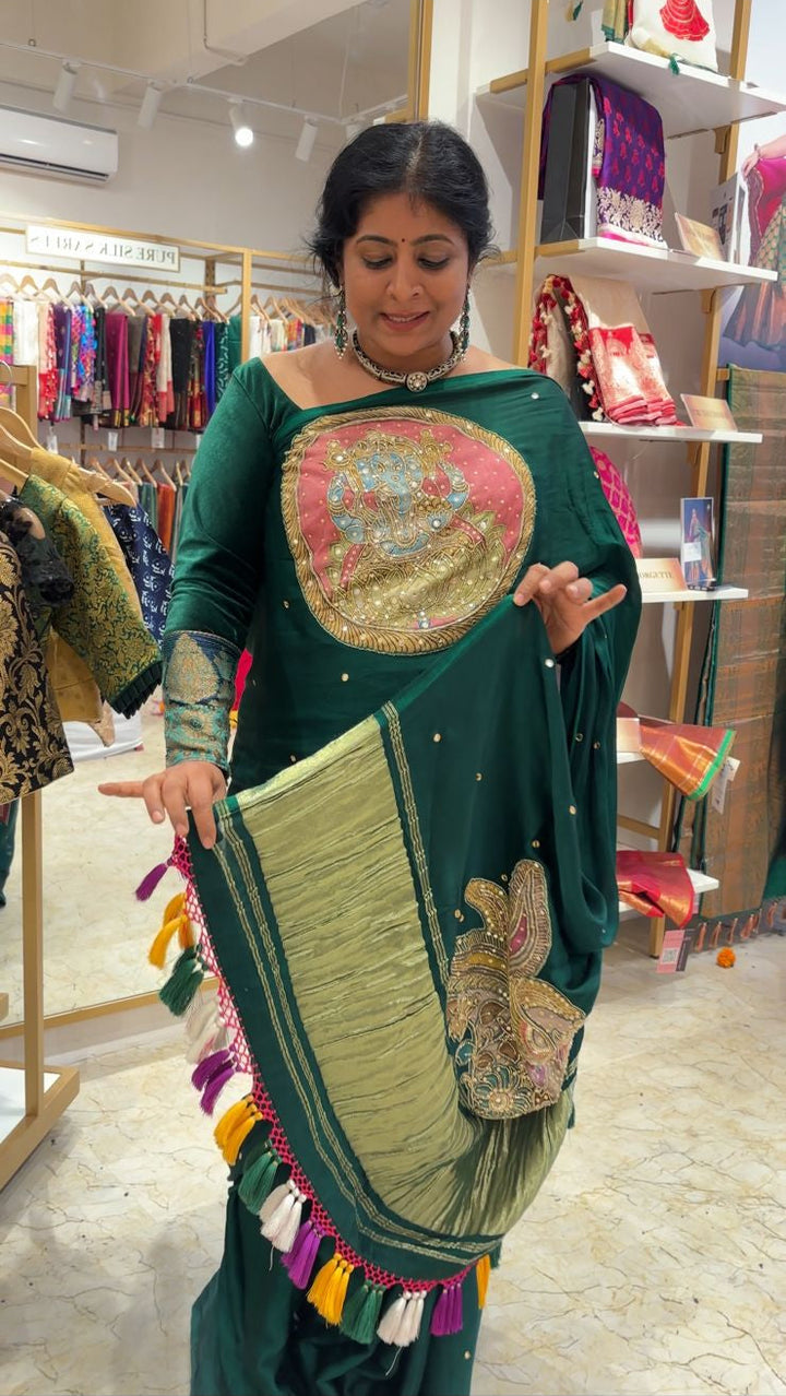 Preorder : Emerald Green Disk Mirror work on Modal Silk Saree with Kalamkari Applique-Hand Embroidery and Lagda Patta Crushed Tissue Pallu
