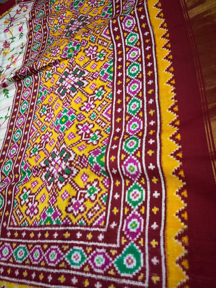 Authentic Double Ikkat Patan Patola Handwoven Saree in Off White with Parsi Gara Hand Embroidery and Patli Pallu   | SILK MARK CERTIFIED | SHOBITAM