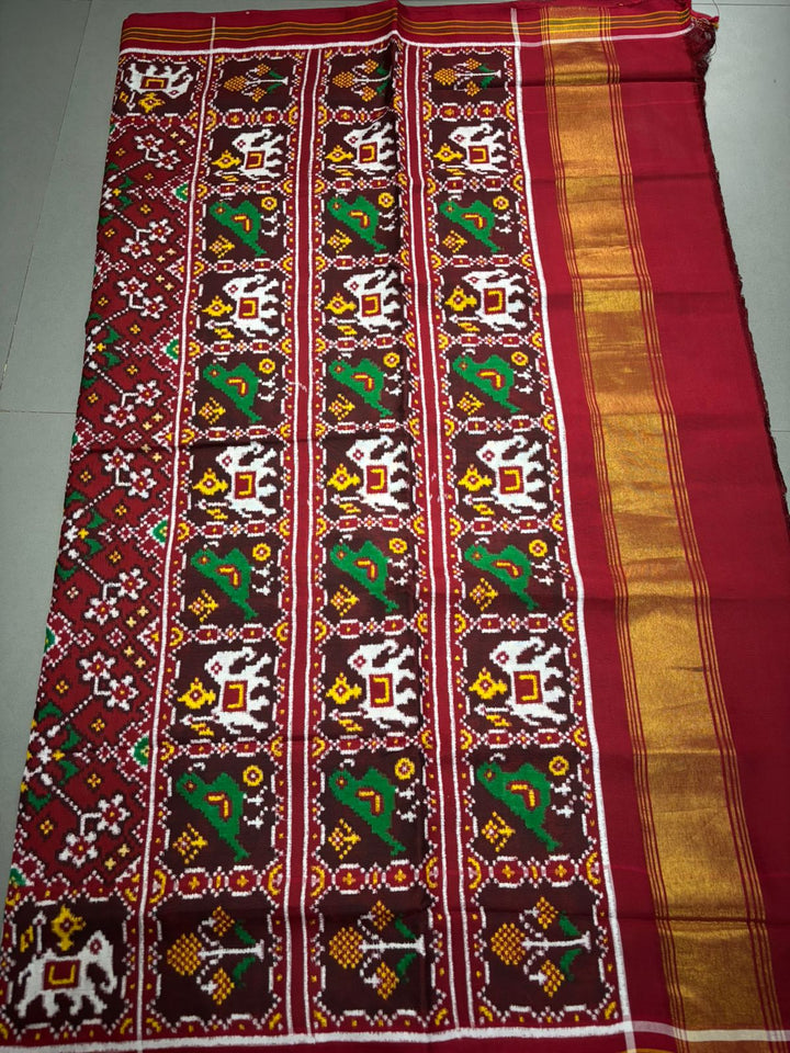 Authentic Double Ikkat Patan Patola Handwoven Pure Silk Saree in Reddish Brown with Navaratna Design and Birds-Elephant Motifs    | SILK MARK CERTIFIED